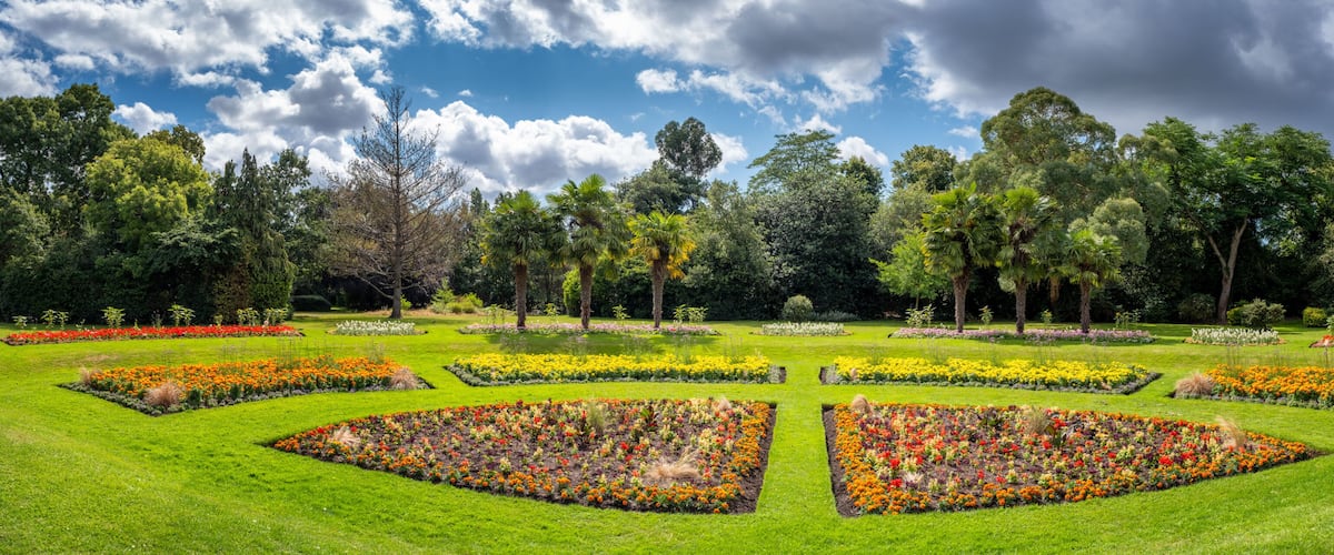 Panoramic view of summer flowers in full bloom in the sunken Garden in Victoria Park in Hackney, East London, England