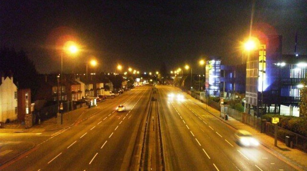 A406 - North Circular Road, NW10. To see the other side of this bridge look at picture: 1042134. The grid square boundary goes right through the centre of the footbridge.