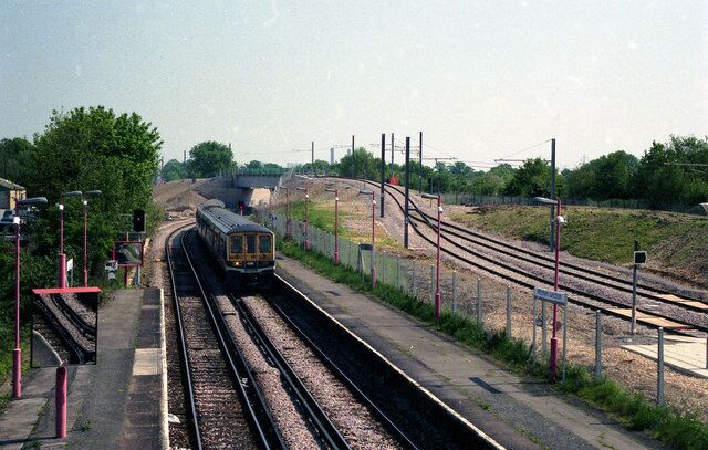 Mitcham junction station A Class 319 'Thameslink' train is approaching the station from the Sutton direction. It will continue to London and Luton via Streatham.
