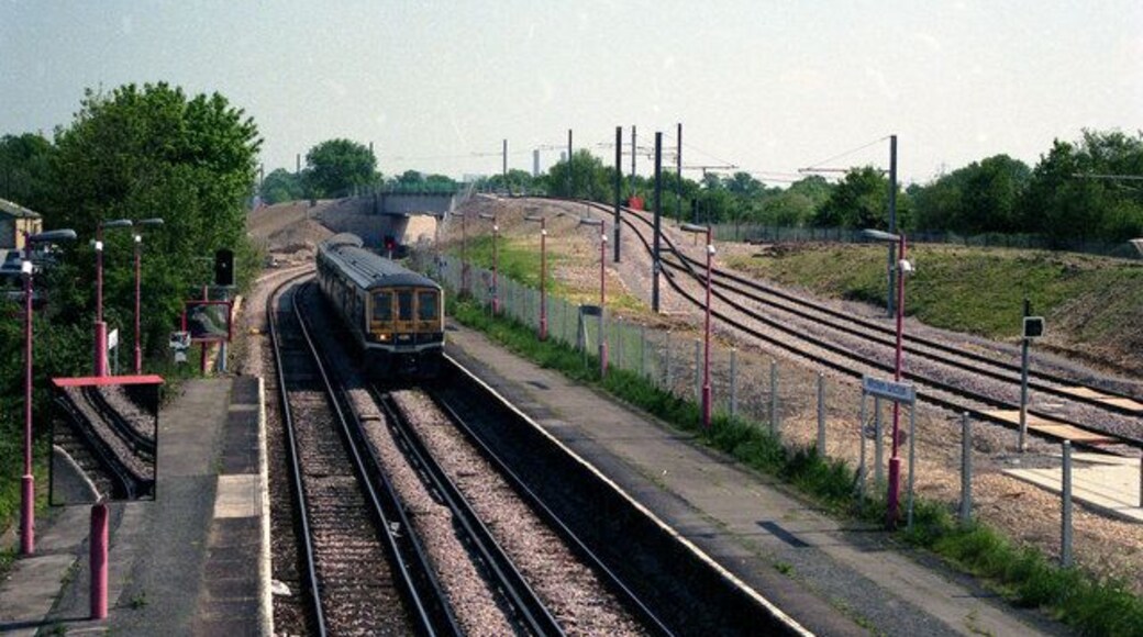 Mitcham junction station A Class 319 'Thameslink' train is approaching the station from the Sutton direction. It will continue to London and Luton via Streatham.