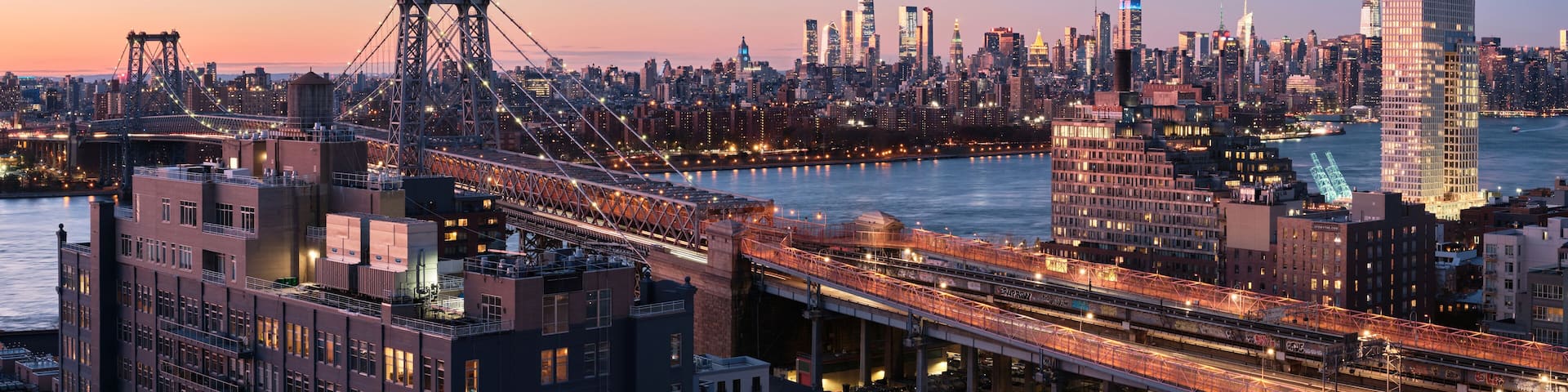 Williamsburg bridge and Midtown Manhattan skyline.