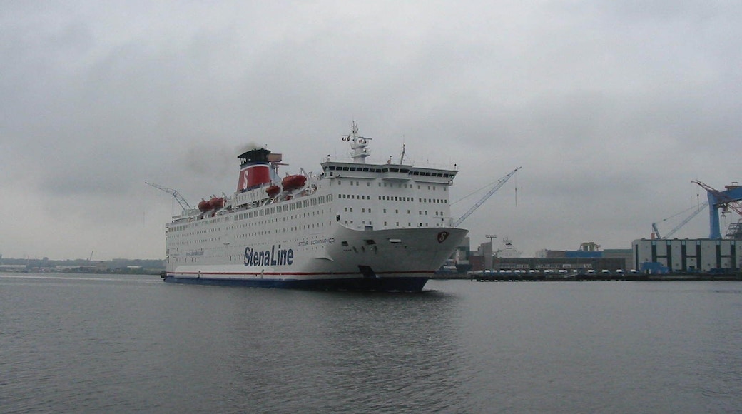 The M/S Scandinavica arrives at the port of Kiel, the major german shipyard of Howaldtswerke Deutsche Werft AG is seen behind.