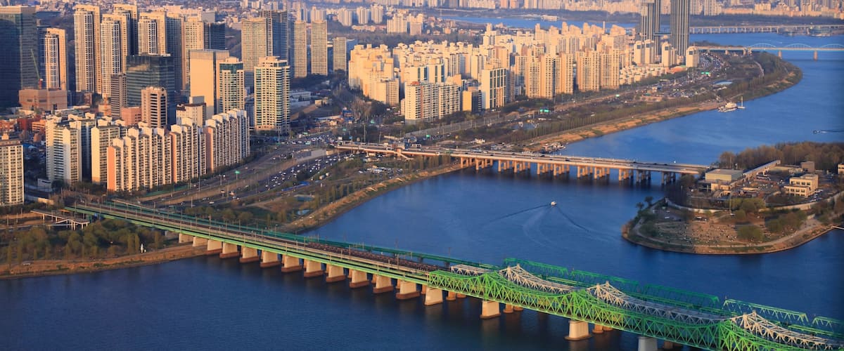Seoul cityscape in South Korea. Aerial view with River Han (Hangang) and Ichon high density residential neighborhood.