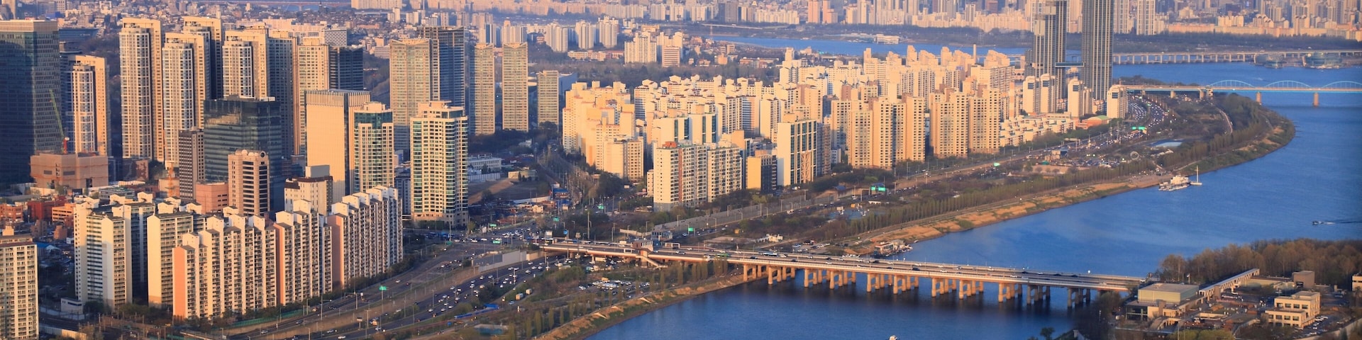 Seoul cityscape in South Korea. Aerial view with River Han (Hangang) and Ichon high density residential neighborhood.