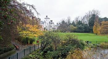 Autumn Avenue House The house, seen from just behind the lake in the park. Some nice autumn colours on the deciduous trees and red berries aplenty on the Holly. The house and grounds were left to the people of Finchley by Henry Charles Stephens in 1918. See http://www.avenuehouse.org.uk/ for more information.