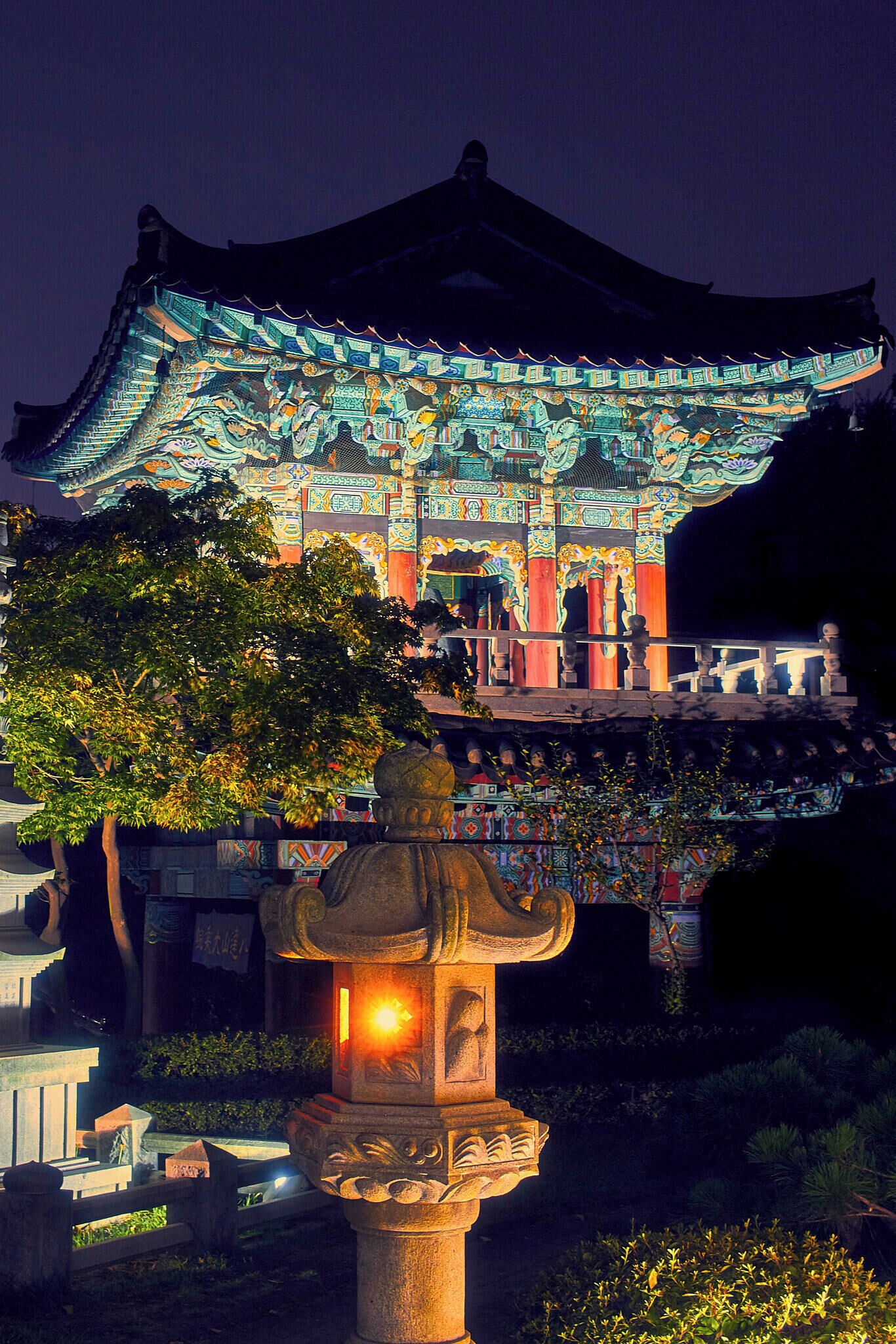 500px provided description: Korean Temple at Night. Visit my <a href="www.smart-art.org">website</a> for more creative work outside of photography. [#travel ,#night ,#light ,#architecture ,#temple ,#building ,#green ,#asia ,#buddhism ,#south korea ,#traditional ,#korean]