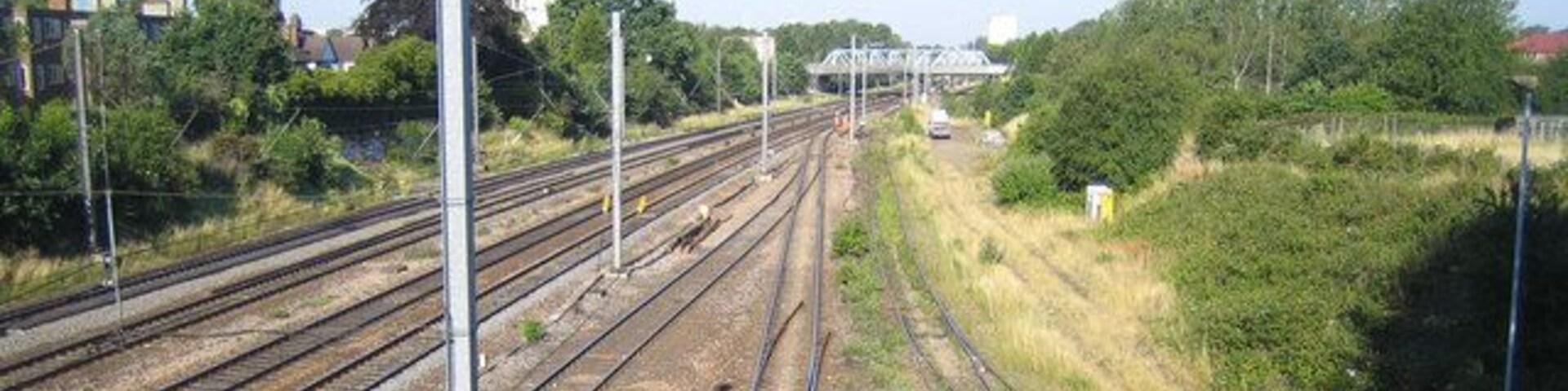 Acton: Main line railway. Viewed from the Noel Road overbridge, the weedy trackwork to the right leads back to the goods yard at Acton Main Line station.