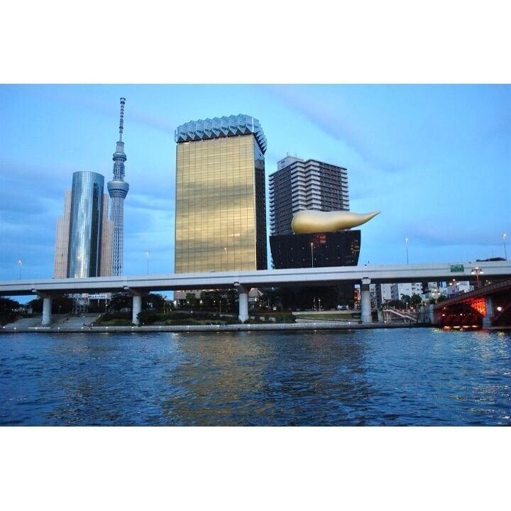 View from the river of Tokyo Sky Tree. I asked my Japanese friend what does the other building symbolizes of, according to them the gold-like structure on the building top is similar to a beer foam. I'm still trying to convince myself on it, but who would argue with the locals, aye? :)