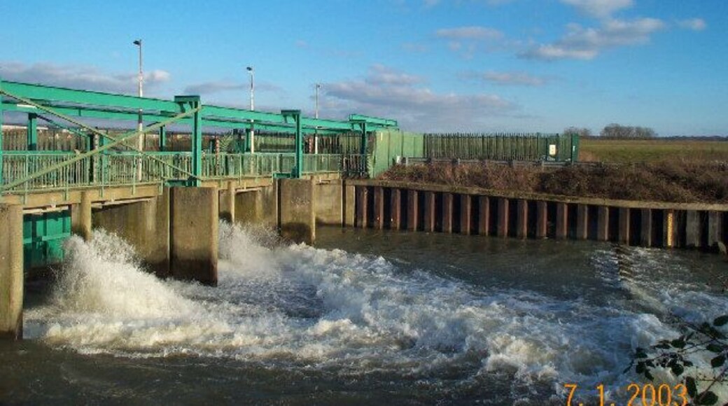 River Lee Flood Relief Channel: Newmans Sluices. Part of the river management infrastructure on the River Lee east of Enfield, pictured on a day of strong water flow.