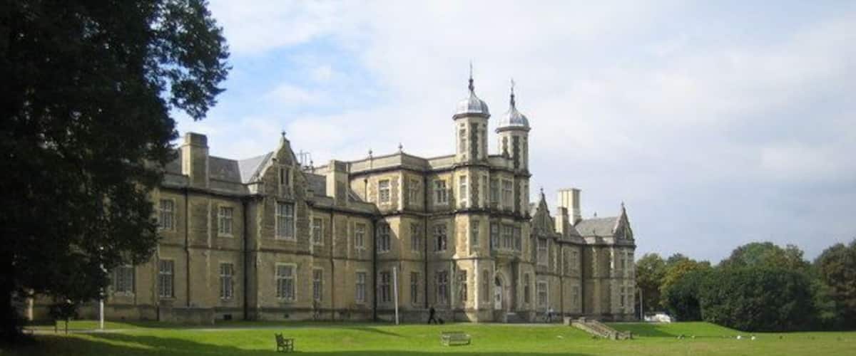 Snaresbrook Crown Court. The building was originally constructed as the "Infant Orphan Asylum" on the instigation of a Congregationalist Minister, Andrew Reed, to provide help and protection for middle-class fatherless children without adequate means of support. When the foundation stone was laid in 1841, Prince Albert performed the deed and the event attracted all the great and the good from Victorian society. The architect was Sir Gilbert Scott and the building was completed and opened in 1843, again by Royalty, in this case King Leopold of the Belgians. The asylum housed up to 600 children who had to be elected for admission by voters, a procedure that continued until 1947. The asylum was later renamed the Royal Wanstead School and became a grammar school after the 1944 Education Act. However dwindling school numbers and a lack of funding eventually forced its closure in 1971. The building was subsequently taken over by Her Majesty's Court Service and today is Europe's busiest court, handling in excess of 7,000 cases a year.