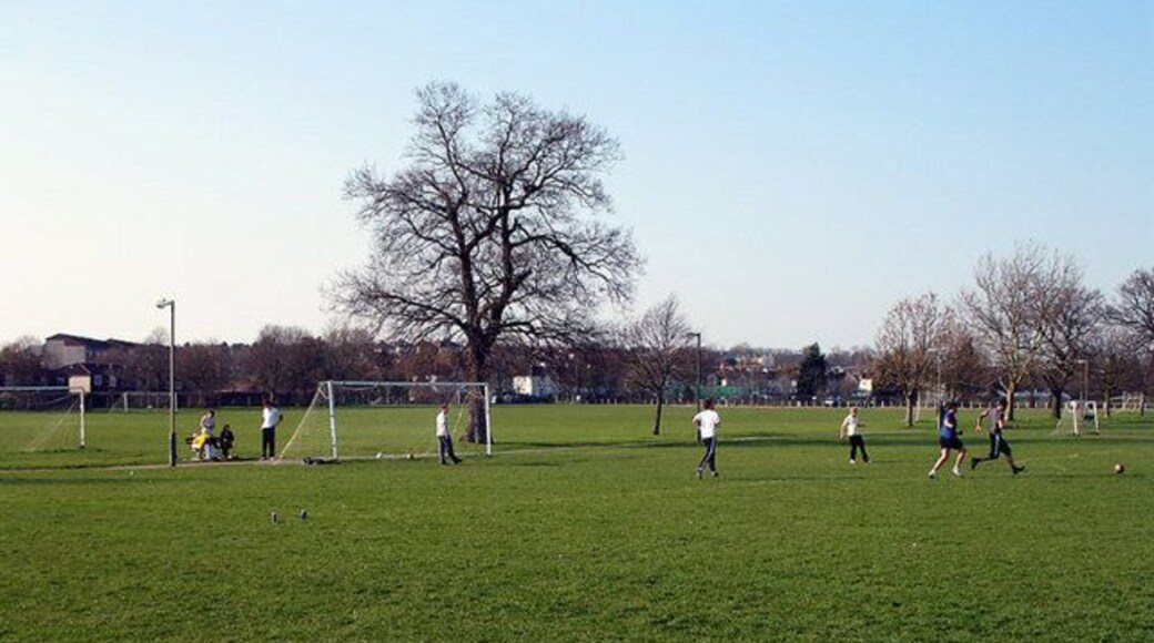 Football Practice A group of lads practice their football skill on a sunday afternoon on Barnet Playing Fields.