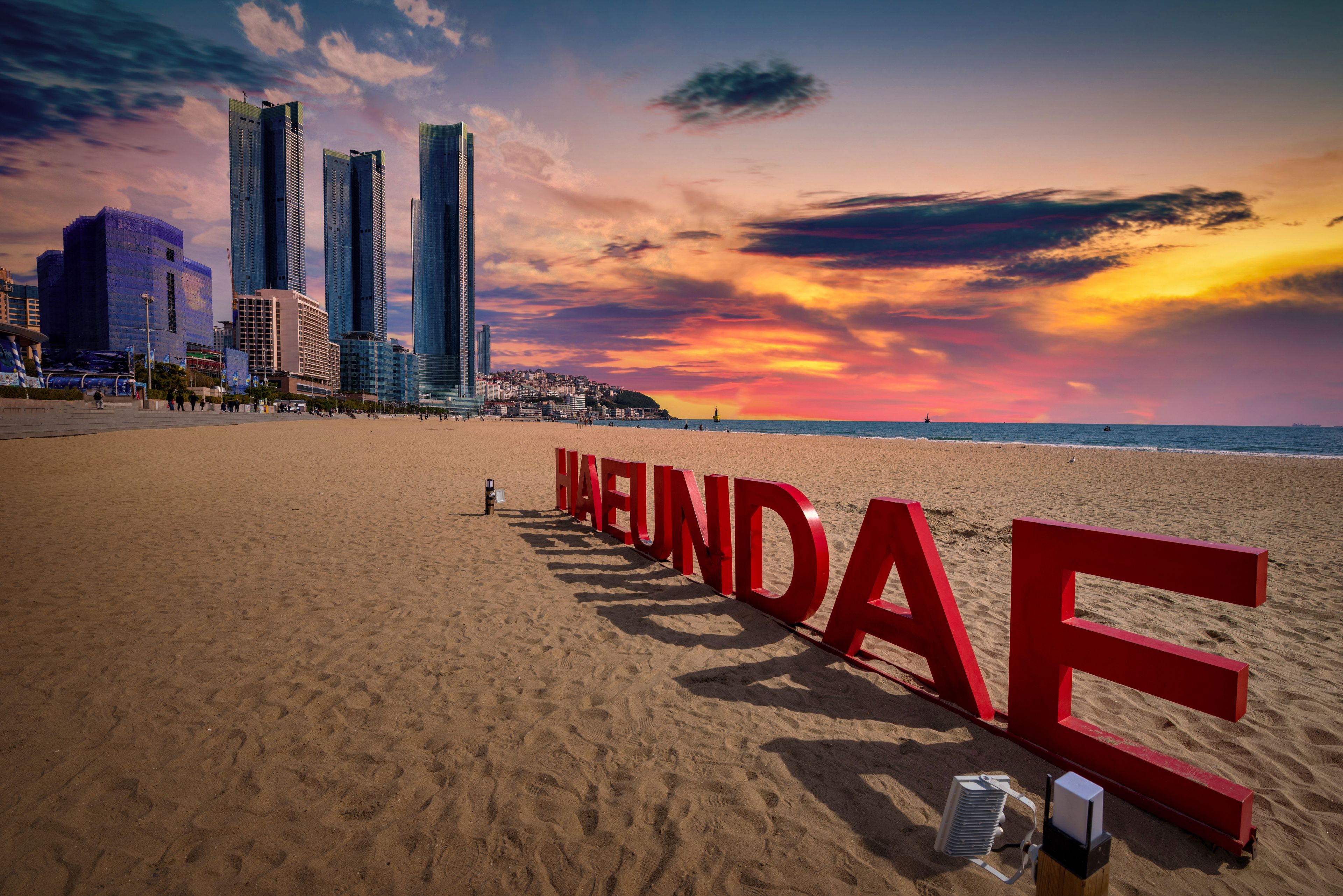 Haeundae beach with busan city at sunset on Busan, South Korea.Haeundae beach with busan city at sunset on Busan, South Korea.