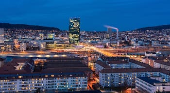 View of Zurich district 4 and 5 and Prime Tower, Hard Bridge from above at night, Zurich, Switzerland