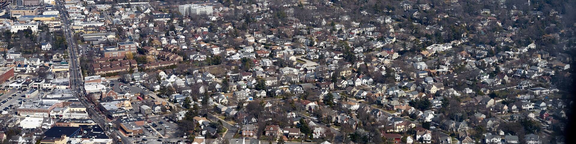 A densely populated urban area with numerous buildings and streets.