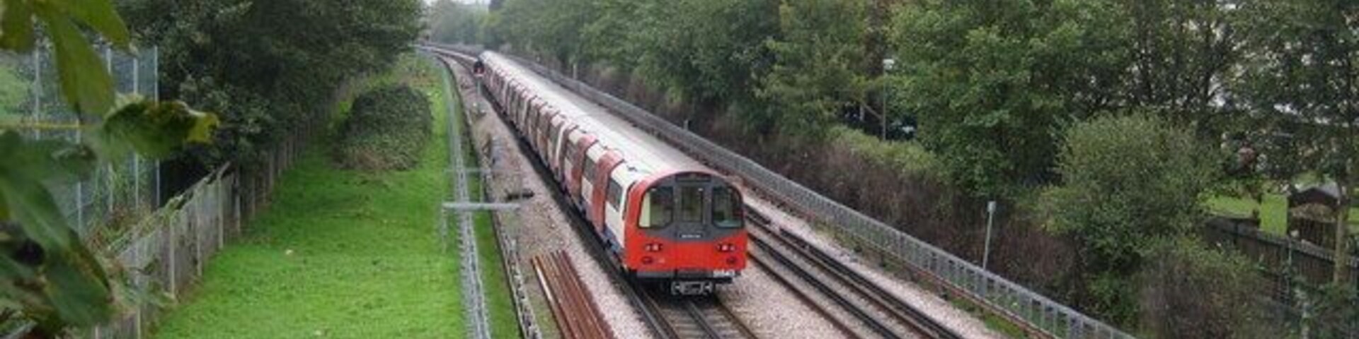 Northern Line railway in Burnt Oak The track bed looks to have been recently refurbished in this view taken from the A5109 Deansbrook Road overbridge. The train is heading south from Edgware towards Burnt Oak station, and the trailing unit is No. 51543.