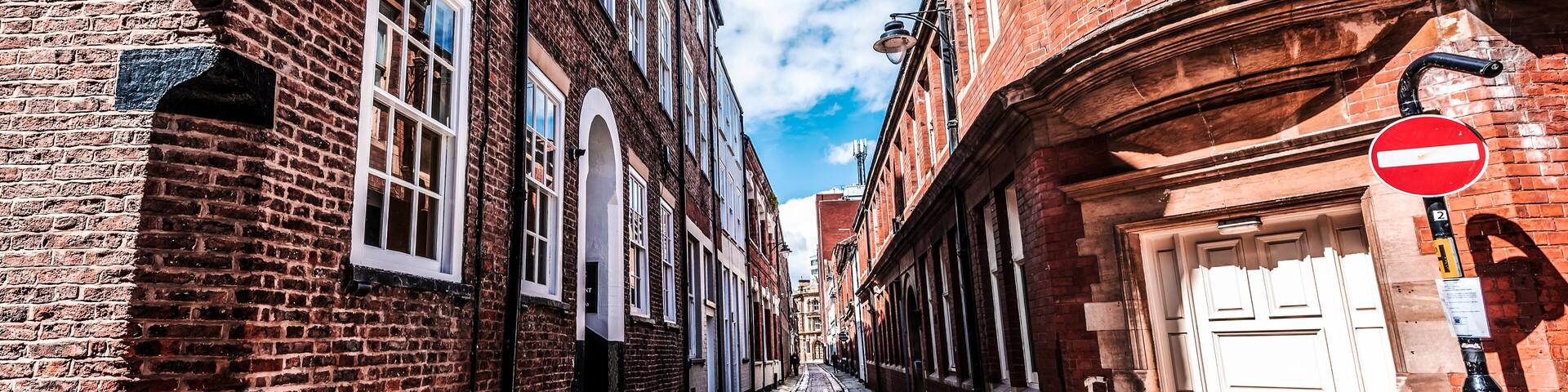 Narrow street with brick buildings in Hull