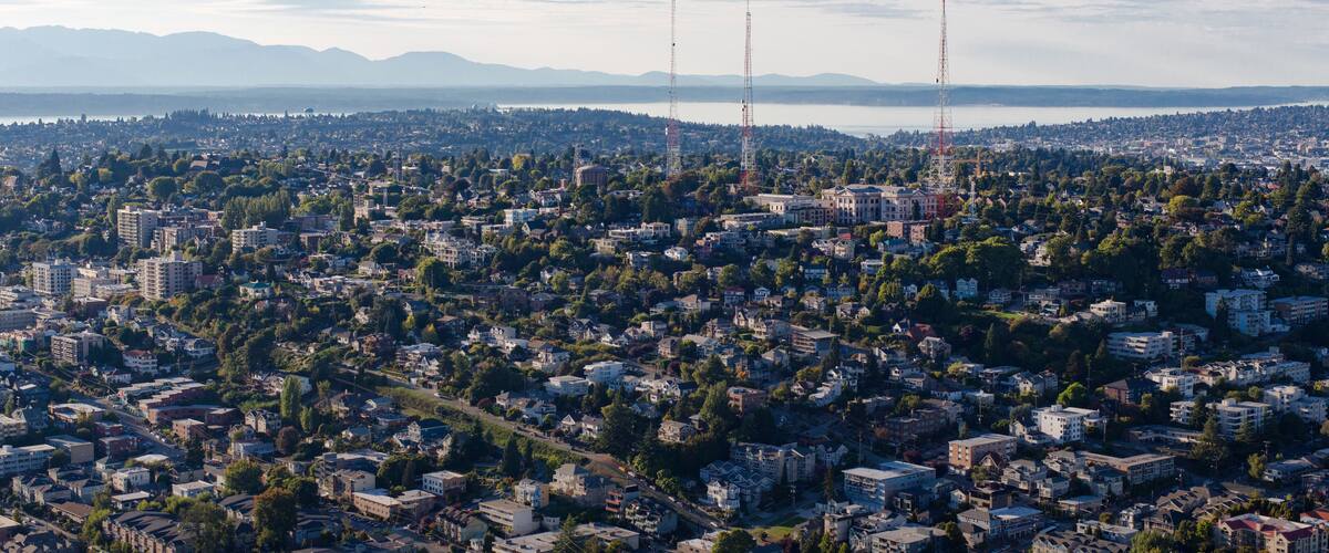 Queen Anne Hill Neighborhood, Downtown Seattle, Washington - Aerial Birds Eye View of the Pacific Ocean, Olympic Mountains