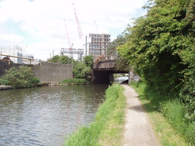 Railway bridge over Grand Union Canal This is the main line from Paddington to the West Country. It is next to the Nestlé Factory which is behind the wall on the left of the photo.