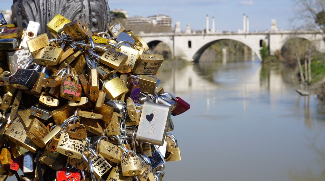 Rome, Italy - March 25, 2018: padlocks left by lovers as a token of love on Ponte Milvio in Rome