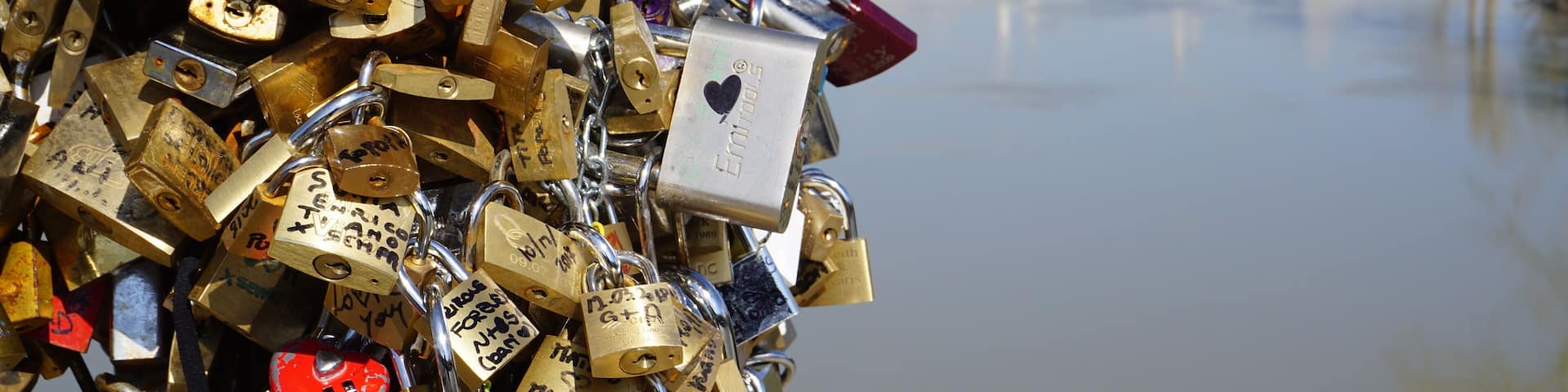 Rome, Italy - March 25, 2018: padlocks left by lovers as a token of love on Ponte Milvio in Rome