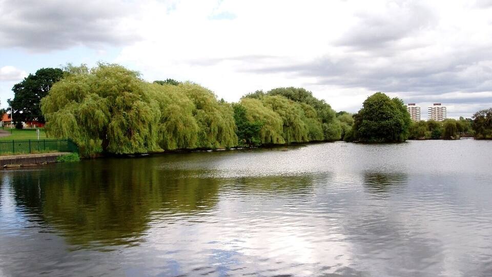 A park dominated by some large lakes, at the end of Ravensbourne River. In the area of Elm Park. Photo taken July 2008. Owner: London Borough of Havering.