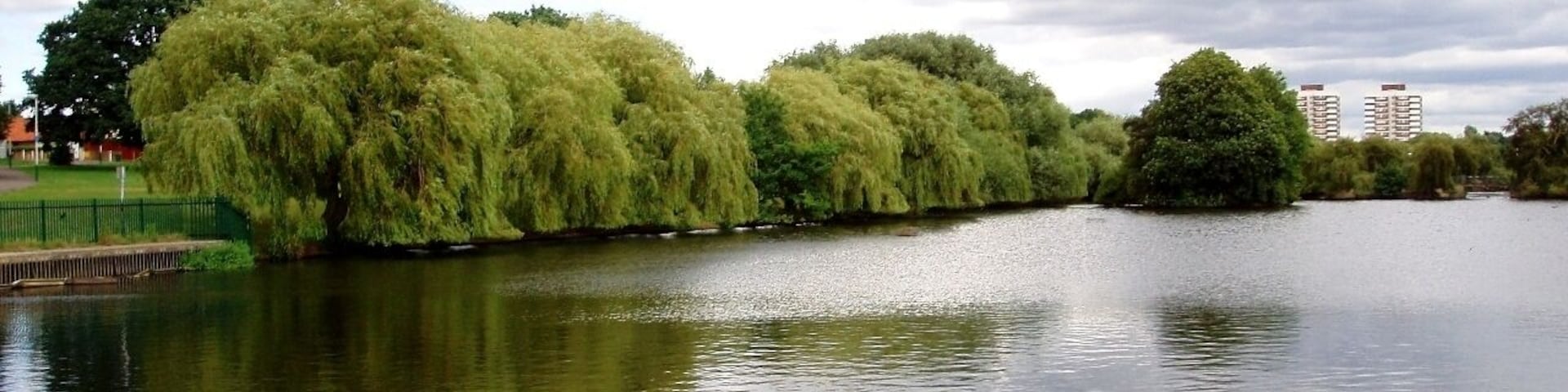 A park dominated by some large lakes, at the end of Ravensbourne River. In the area of Elm Park. Photo taken July 2008. Owner: London Borough of Havering.