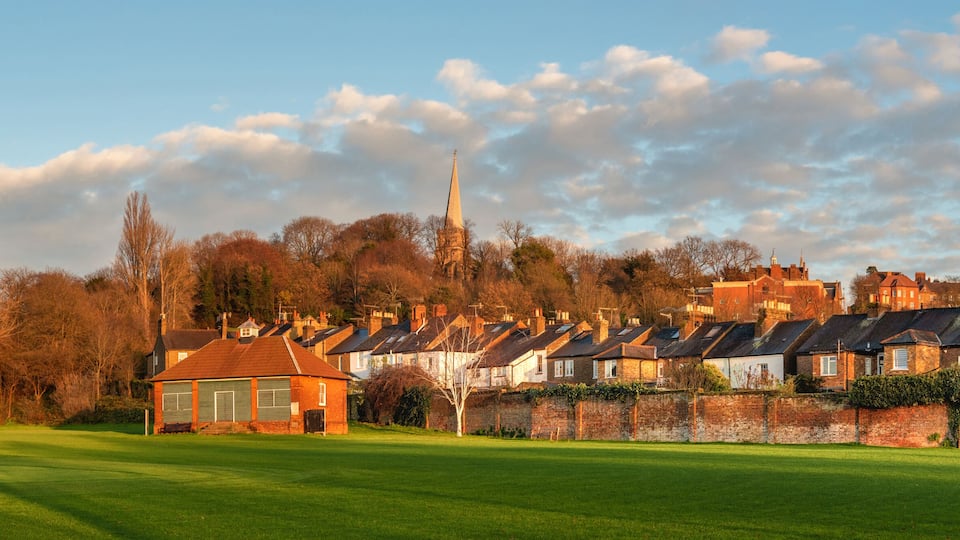 Panoramic landscape of Harrow on the Hill town in Greater London with visible Harrow School buildings on the top, England