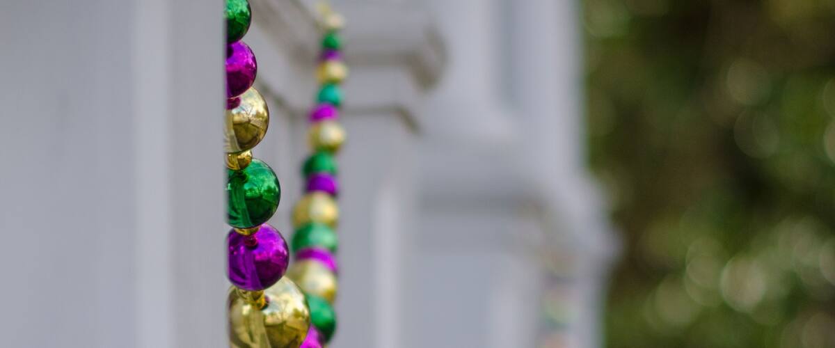 Mardi Gras Beads Decorating a House in Uptown New Orleans, Louisiana, USA
