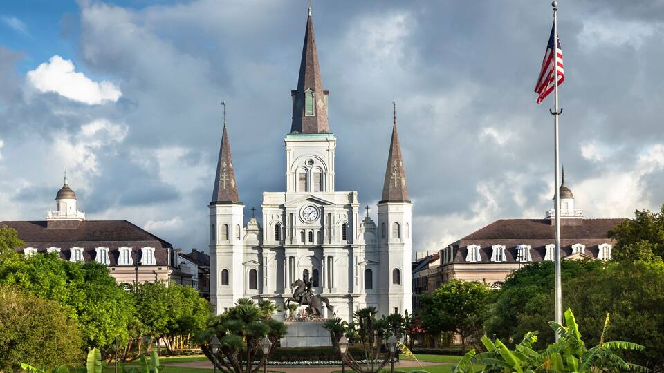 Historic St. Louis Cathedral panorama and the statue of Andrew Jackson across Jackson Square in New Orleans Louisiana USA
