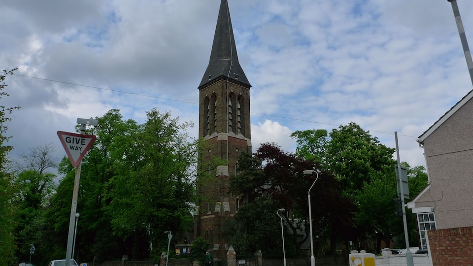 Holy Saviour Church, St Saviours Road, Croydon. Image taken from the South West. Both the church and the wall surrounding the churchyard are Grade II listed structures. Croydon, Holy Saviour at the Anglican Diocese of Southwark Church Of St Saviour at English Heritage Wall Enclosing Churchyard Of Church Of St Saviour at English Heritage