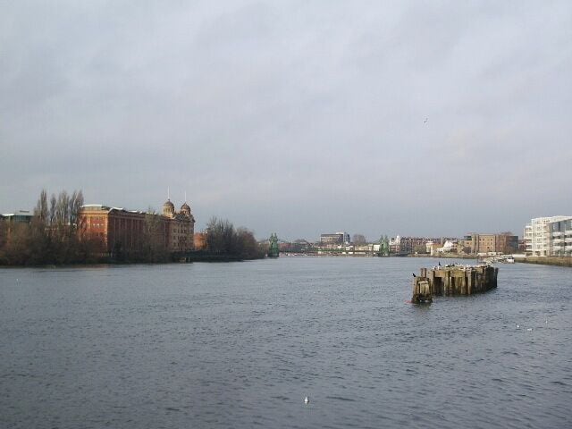 River Thames The building to the left is Harrods Repository building, in the centre is Hammersmith Bridge