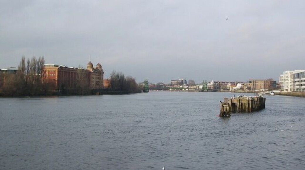 River Thames The building to the left is Harrods Repository building, in the centre is Hammersmith Bridge