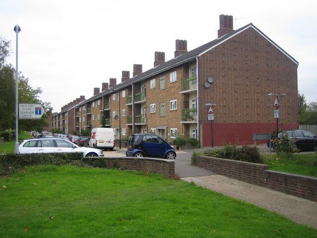 Rayners Lane: Alexandra Avenue flats This is one of several blocks of 1950s council-owned flats set back on the eastern side of Alexandra Avenue. The road name plate with the "No through road" symbol shows the way to Learner Drive, so-named as the houses along it were built on the site of the former Harrow Driving Centre.