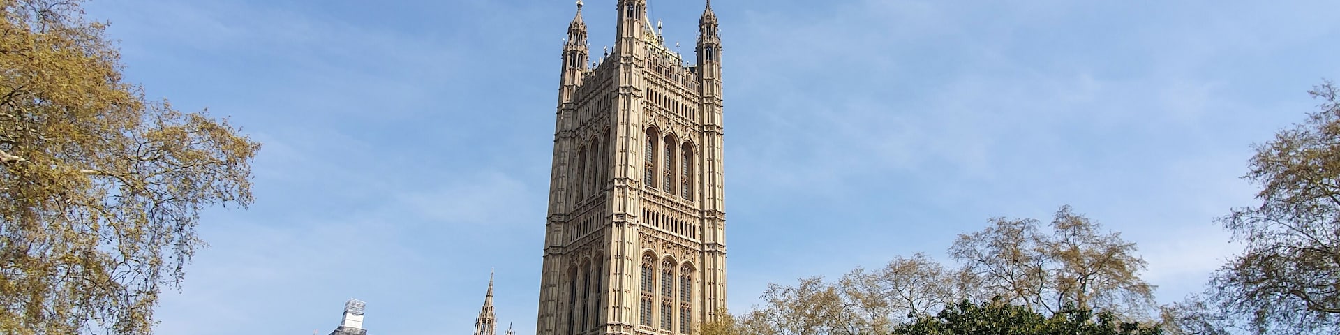 Houses of Parliament London UK view from Abingdon Street Gardens