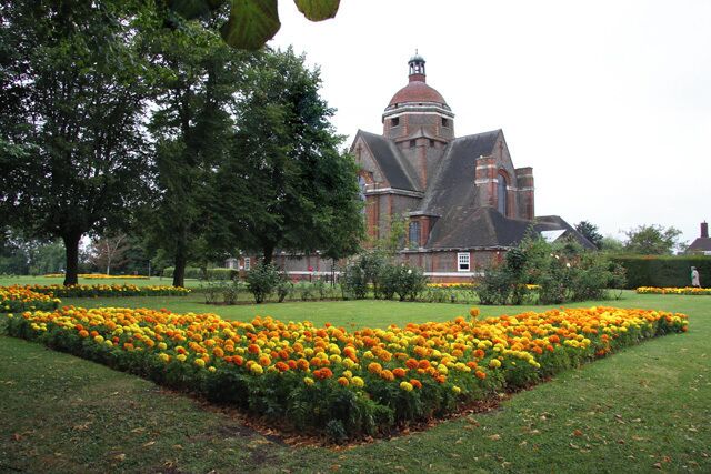 Marigolds in Central Square. Orange and yellow seem to be the in colour in Hampstead Garden Suburb this year. Behind is Hampstead Garden Suburb Free Church - see 359582 for more information.