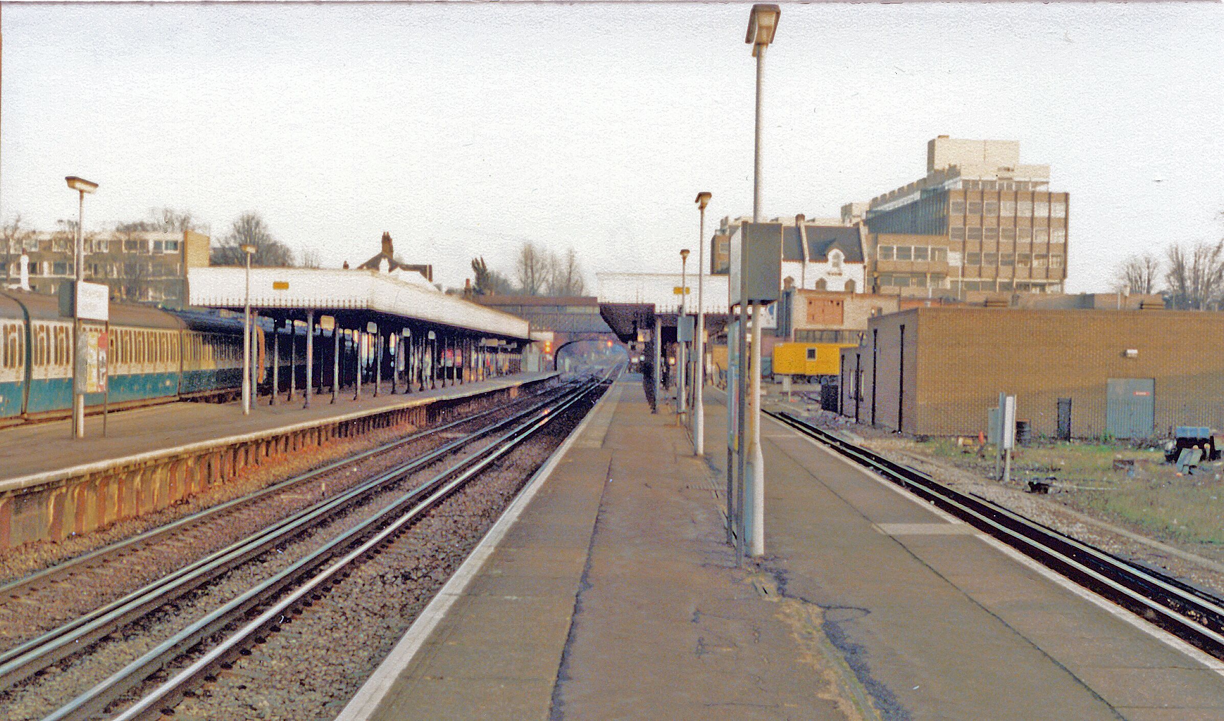 Beckenham Junction station, 1983. View eastward, towards Bromley South etc.: ex-SE&CR Chatham main line, Victoria - Bromley South - Chatham - Ramsgate/Dover, junction of the Mid-Kent line via Lewisham and the line from Crystal Palace via Birkbeck. In 2000 the Birkbeck line was taken over by the Croydon Tramlink line, which terminated in the bay platform on the right. (Cf. my TQ3769 : Beckenham Junction Station, which shows that little had altered since 1961).