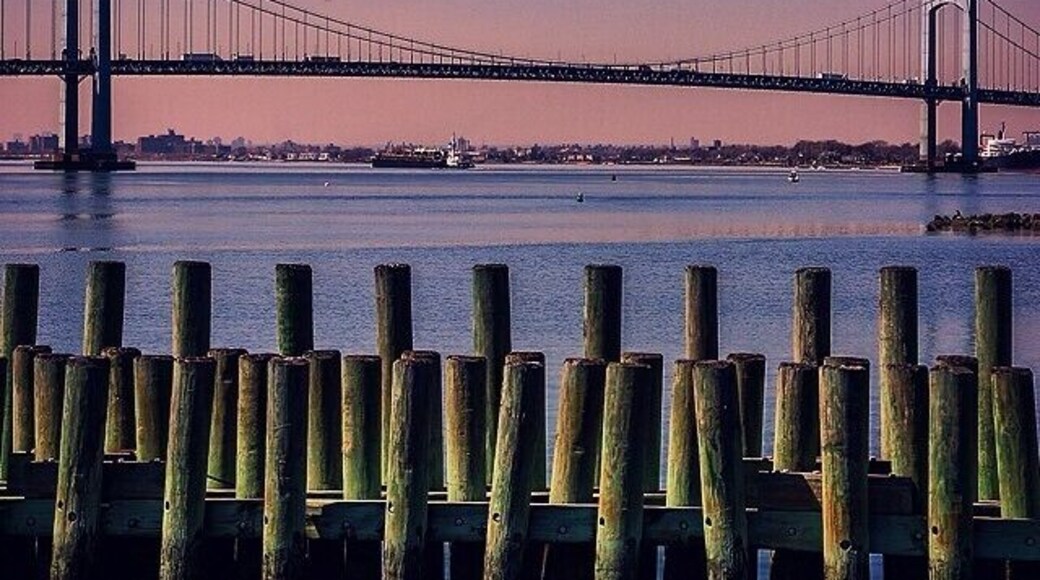 One of the best views and lesser known areas in New York. Sunset behind the Throgs Neck Bridge from Queens, Fort Totten State Park #travel #nyc #sunset