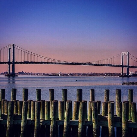 One of the best views and lesser known areas in New York. Sunset behind the Throgs Neck Bridge from Queens, Fort Totten State Park #travel #nyc #sunset