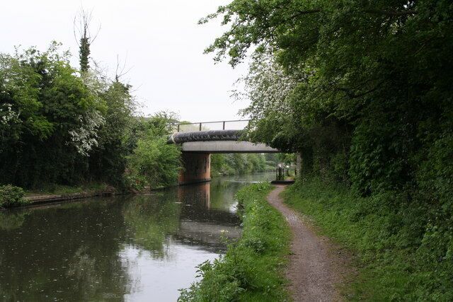 Kensington Road bridge over Paddington Arm, Grand Union Canal This shows the west face of the bridge, which carries Kensington Road, a minor road in the Greenford area. There is also a pipe bridge which can be seen just this side of the bridge.