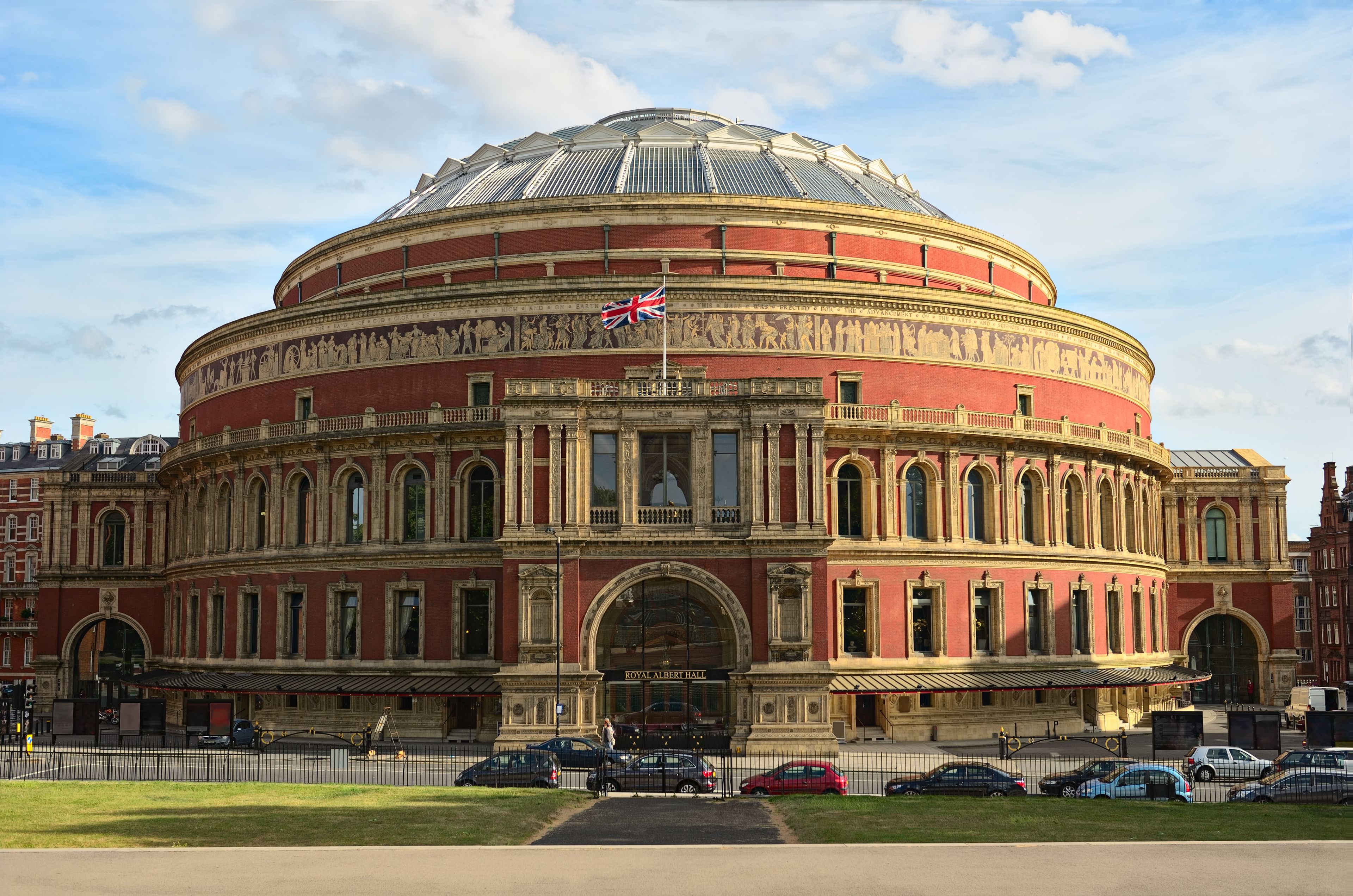 A large, historic building with a prominent dome and intricate facade.