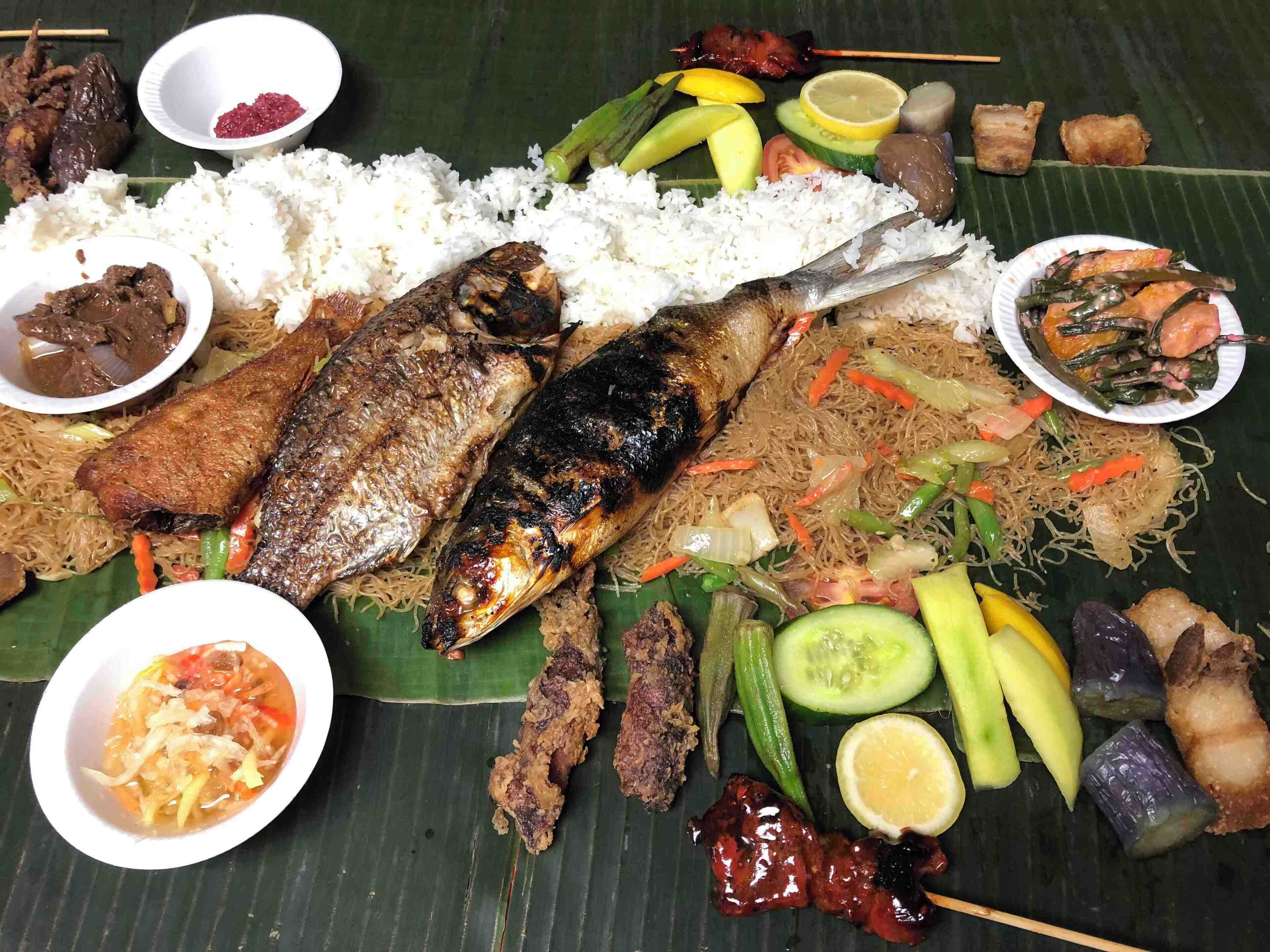 A delicious spread of food to share with your friends! Eat with your hands or with a fork; you do you!