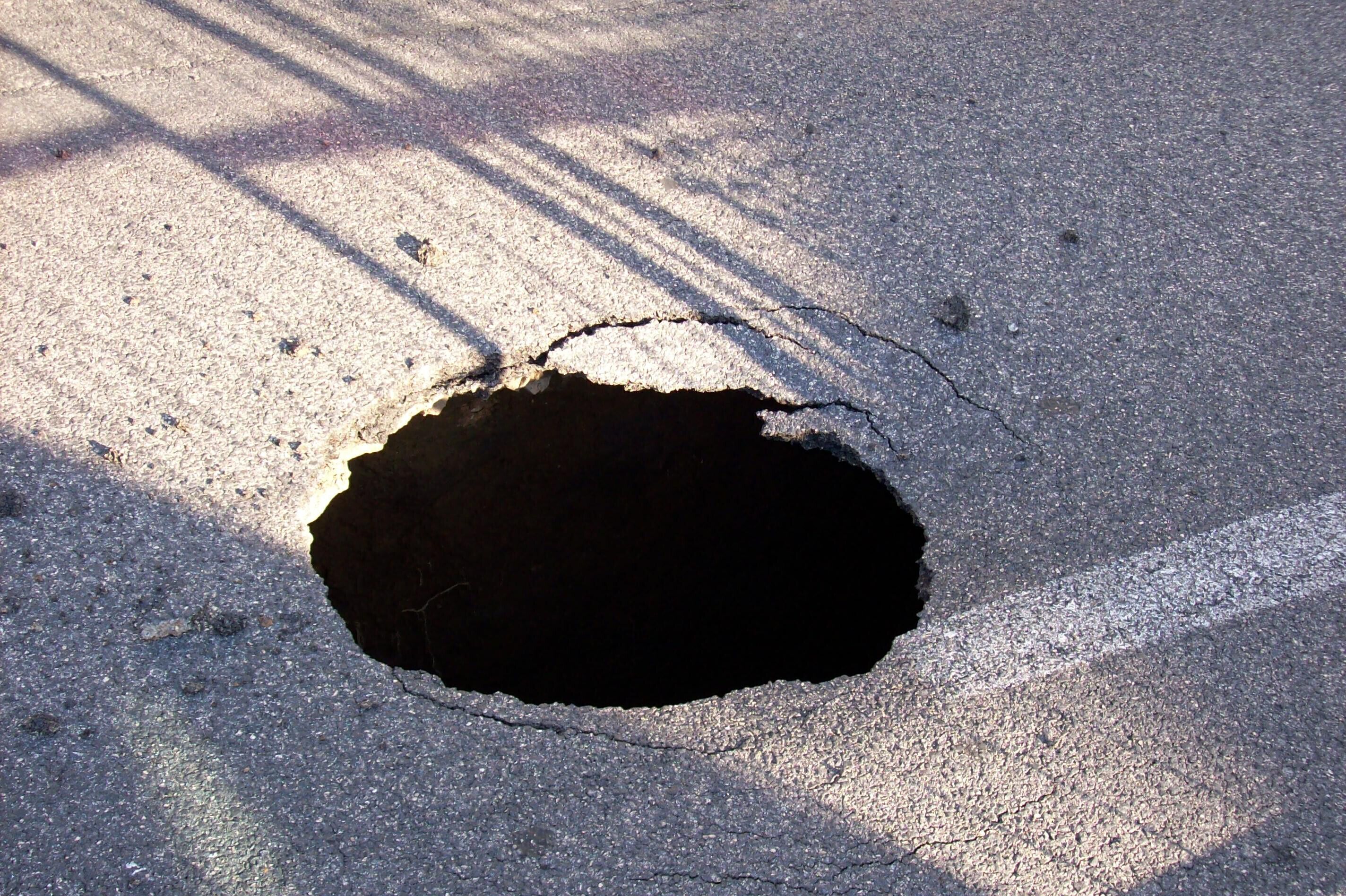 Pothole broken in via di Torrevecchia in Rome, Italy, on 4 August 2014 around 8am. The hole is approximately 40-50 centimetres wide (16”-20”).