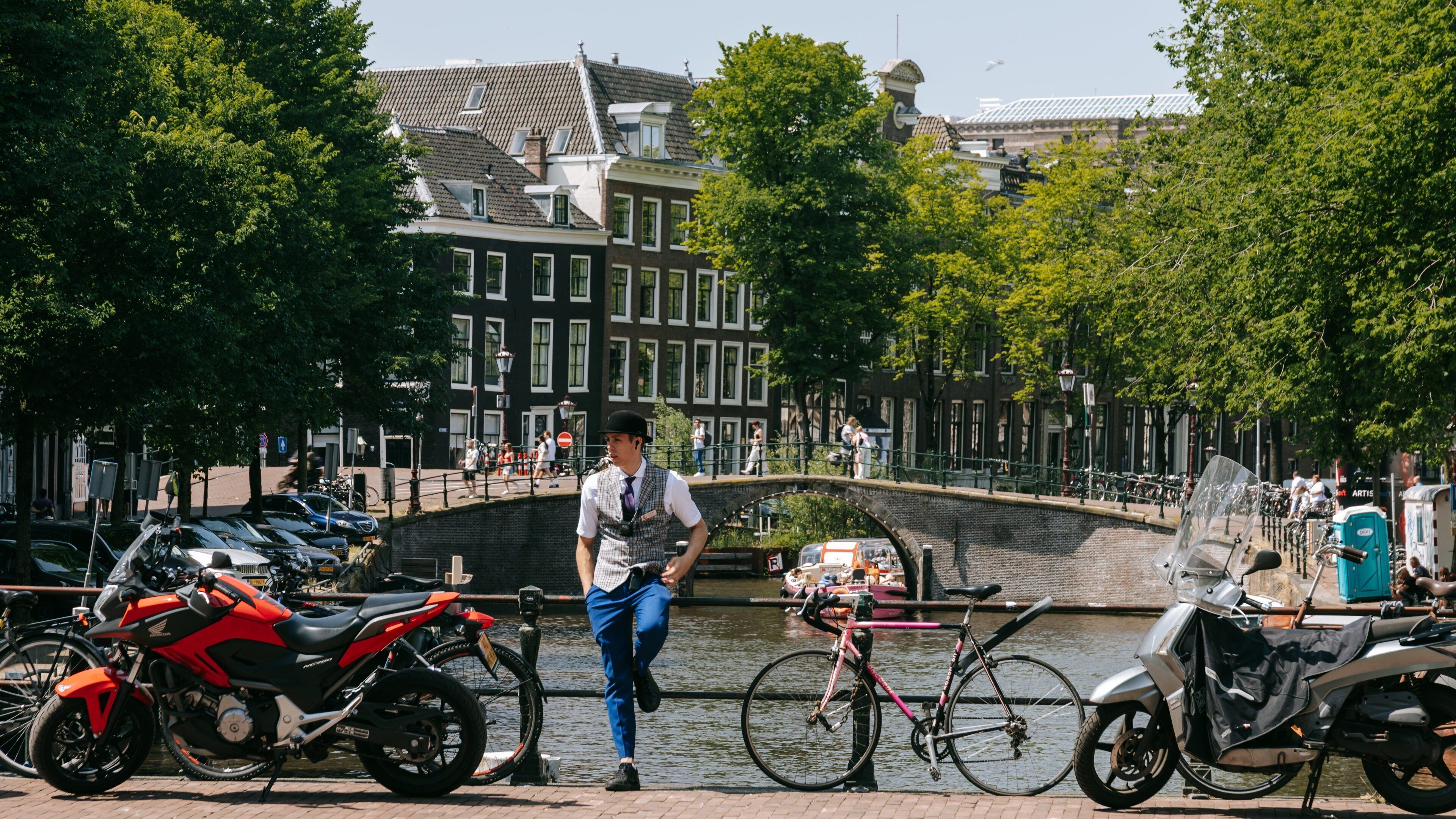 Grachtengordel-Zuid which includes a river or creek as well as an individual male