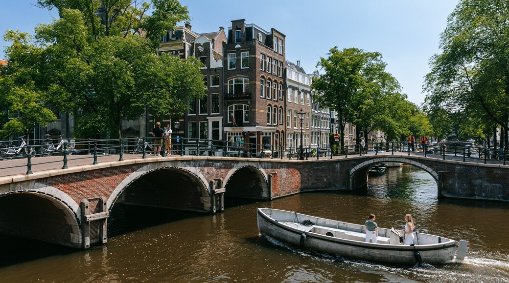 Grachtengordel-Zuid showing a river or creek, a bridge and boating