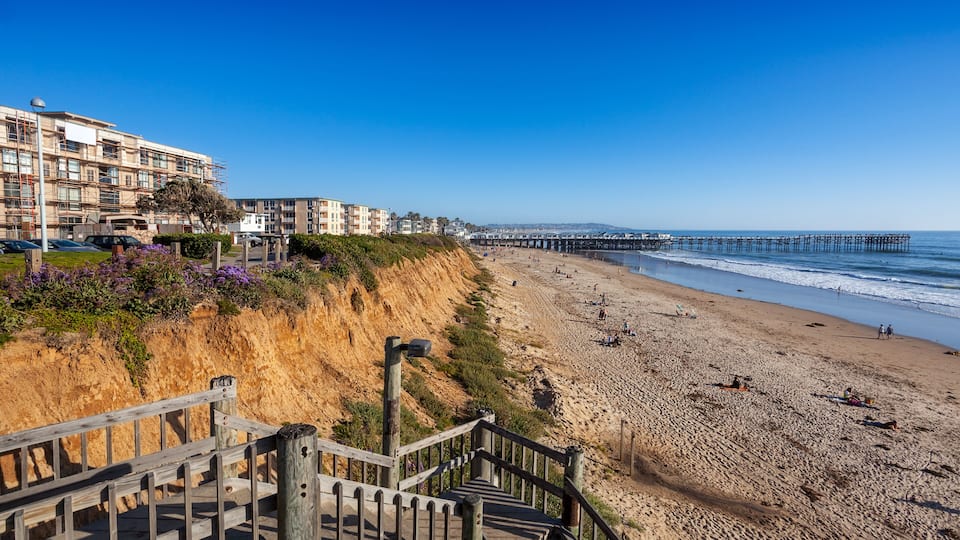 Steps down to North Pacific Beach, looking south to Crystal Pier and Mission Beach; Shutterstock ID 622036673; Purchase Order: -