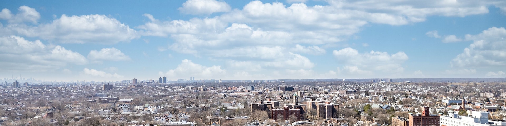 Aerial view over Brooklyn featuring Belt Parkway, Shirley Chisholm State Park, Spring Creek Beach, Pennsylvania Ave, Flatlands Ave, and Howard Beach.