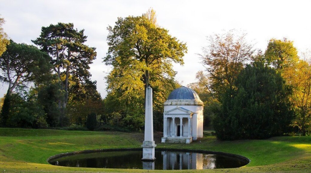 The Ionic Temple, Obelisk and Mirror Pond, Chiswick House Chiswick House as we know it was the brainchild of the 3rd Lord Burlington (1694-1753), and though both house and gardens have had to survive periods of neglect, the overall scheme - following restoration work in the last half-century - remains essentially his. According to Colen Campbell's 'Vitruvius Britannicus' (published in the 1720s) the little building shown here - which Campbell called 'bagno' (Italian for bath-house) - was Lord Burlington's first architectural project, dating from 1717. In the years which followed, Burlington - assisted by William Kent - went on to produce the design for the house itself. (Source: the Middlesex volume of Pevsner's 'The Buildings of England'.)