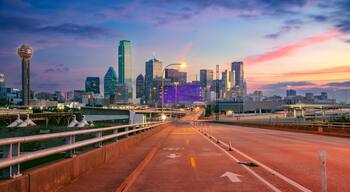 Dallas, Texas, USA. Cityscape image of downtown Dallas, Texas with highway and bike trail leading in to the city at beautiful sunrise.