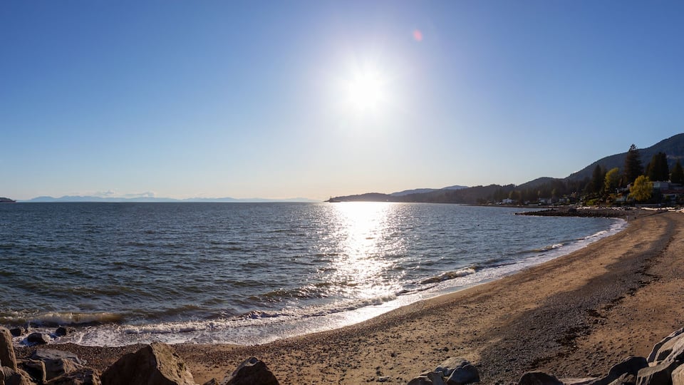 Dundarave Park, West Vancouver, British Columbia, Canada. Beautiful panoramic view of a sandy beach on Pacific Ocean Coast during a sunny summer evening.