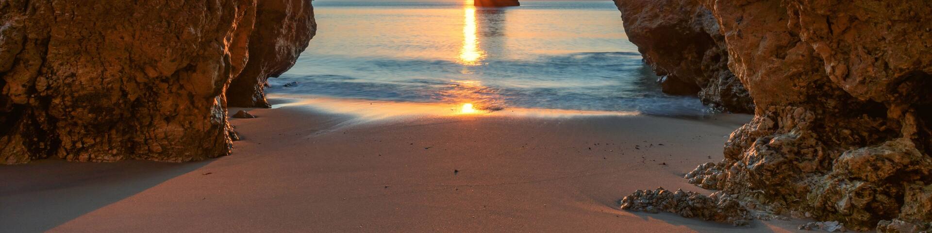 dream beach at sunset on famous camillo beach near lagos algarve portugal - for websites, banners, cards, ...